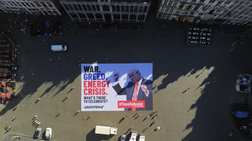 Greenpeace Unfurls Anti-Trump Banner at Brussels Grand Place During US Anniversary Celebrations