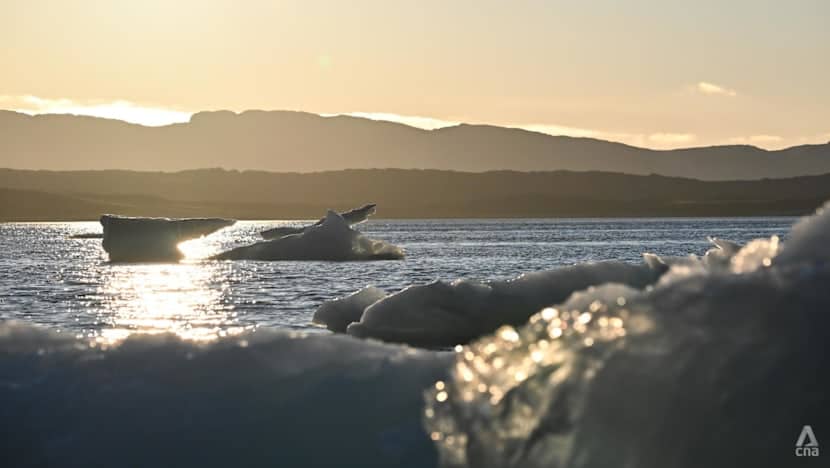 Greenland's Melting Ice and Warming Climate Pose Global Warnings Beyond the Arctic