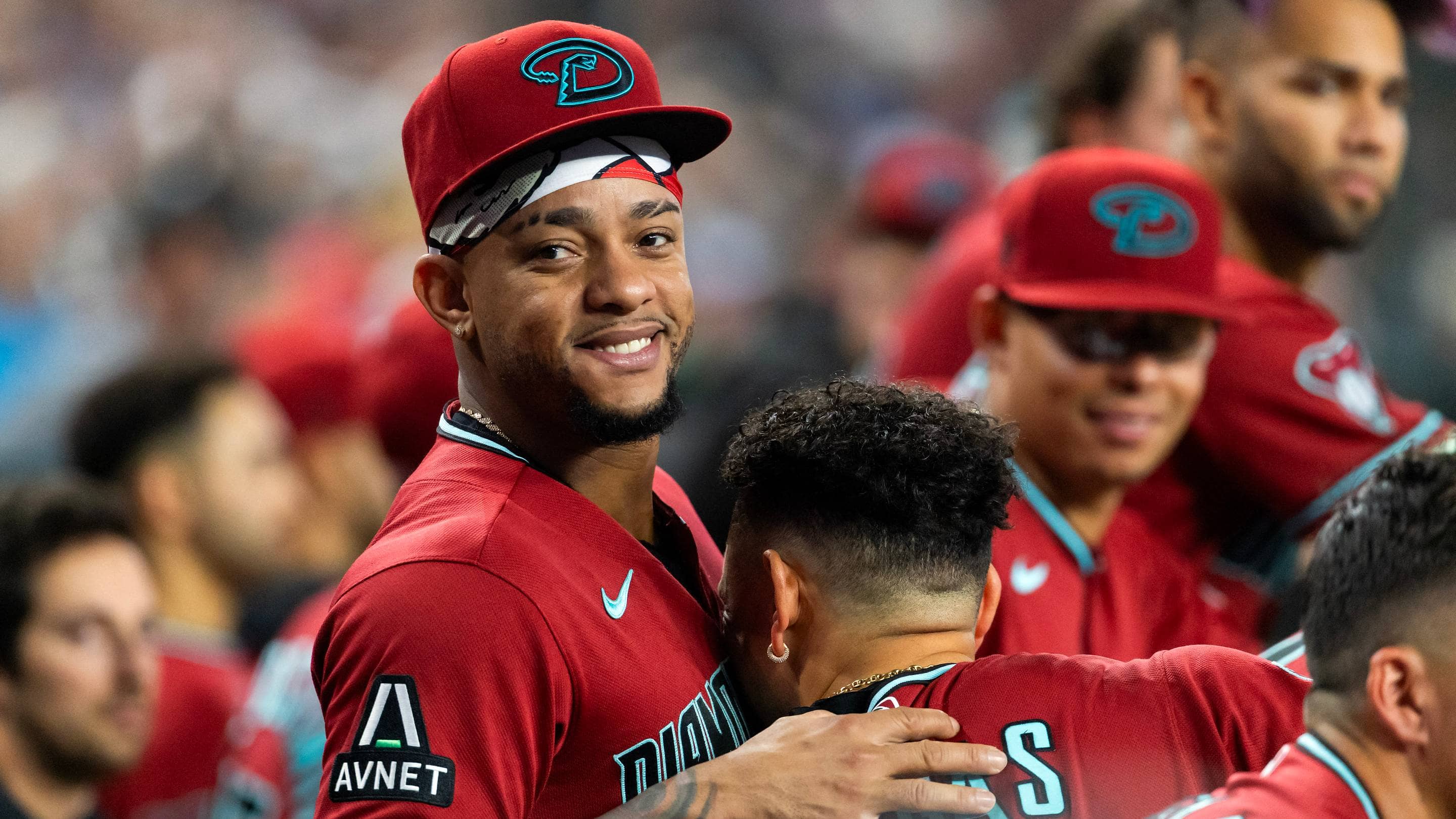 Ketel Marte and Ildemaro Vargas Sit in Dugout During Diamondbacks vs. Phillies Game