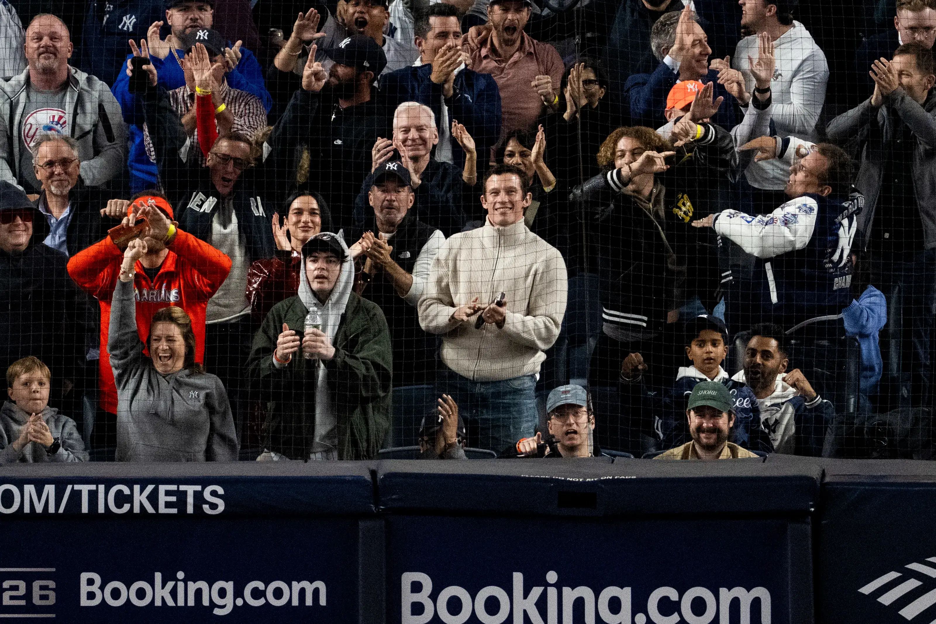 Dua Lipa and Callum Turner Share Seats with Marlins Man at Yankees Playoff Game